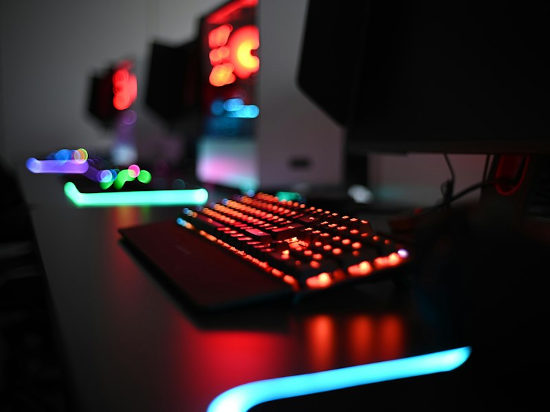 Close-up of a gaming controller and notebook